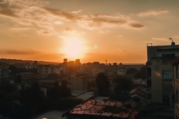 A sunset over a city with a few clouds in the sky