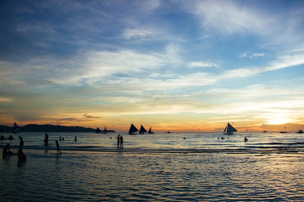 Sunset on the coast. Sea and sand. Sunset light. Beautiful nature. Seascape. Tropical climate. 