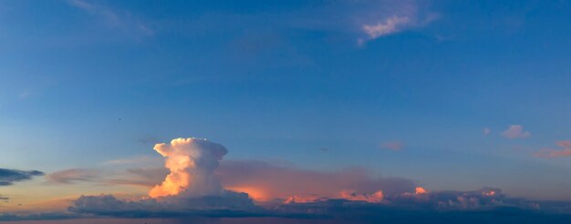 Sunset or dawn, beautiful colored sky with clouds, drone view, bright summer landscape.