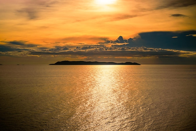 Sunset at Giant cliff at Larn island Koh Larn Beautiful of sea at Chonburi Thailand