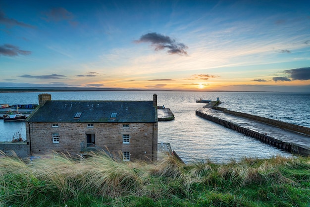 Sunset over the harbour at Burghead