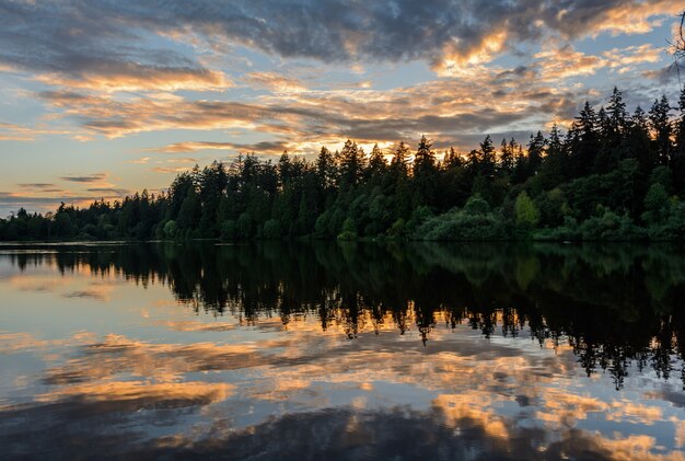 Photo sunset on lake, evening lake, lake at sunset