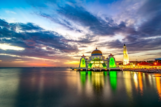 Sunset moments at malacca straits mosque ( masjid selat melaka), it is a mosque located on the man-made malacca island near malacca town, malaysia