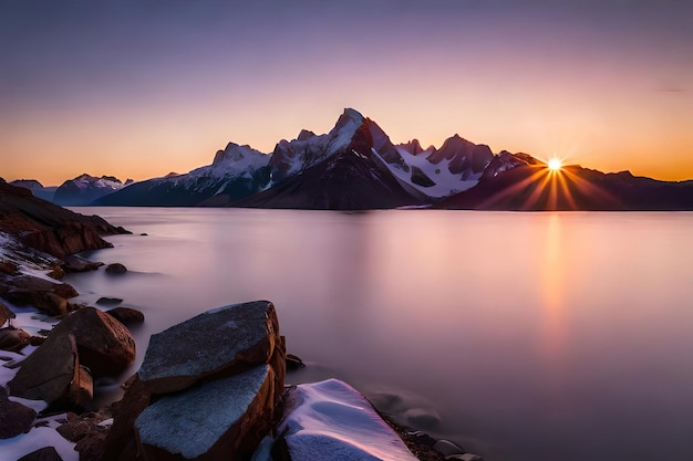 A sunset over a mountain lake with the sun setting behind it