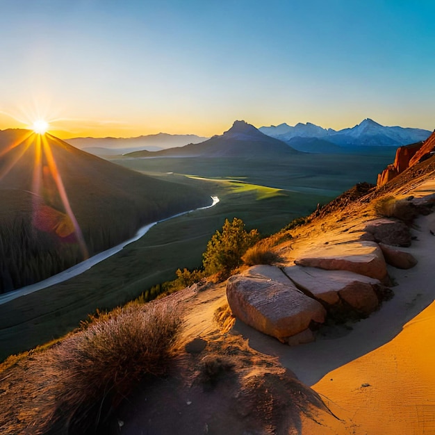 A sunset over a mountain with a river and mountains in the background.