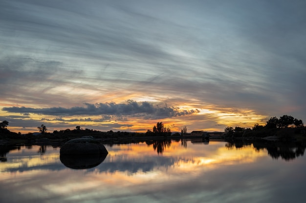 Sunset in the natural area of the Barruecos. Malpartida de Caceres. Extremadura. Spain.