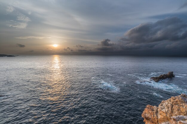 закат и ночь на галисийском побережье Испании