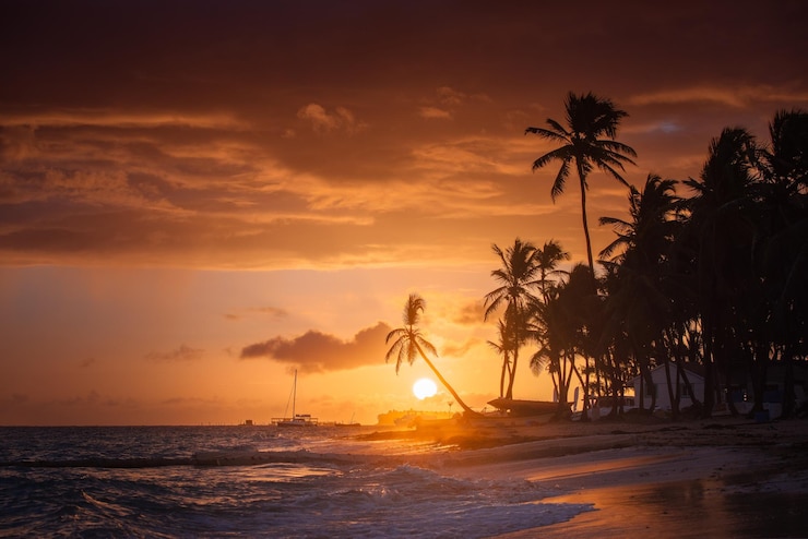 Photo sunset on the paradise beach tropical paradise white sand beach palm trees and clear water