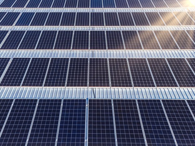 Sunset rays over a photovoltaic power plant.,