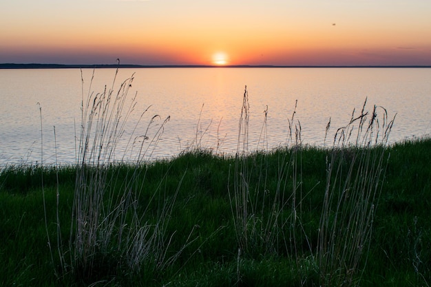 Sunset on the river bank