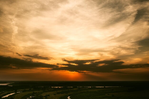 Sunset on the river Beautiful nature Open space View of the sun Landscape