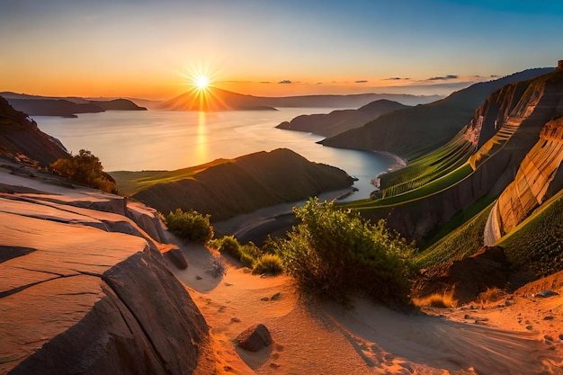 A sunset over a sand dune with the sun setting behind it