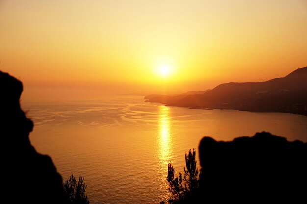 Sunset on the sea, coast of Alanya Turkey. Bright sunset on Cleopatra beach