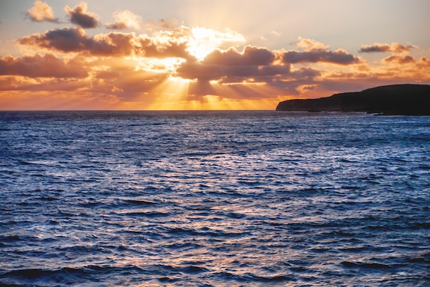 Sunset over the sea near the Gozo island, Malta.