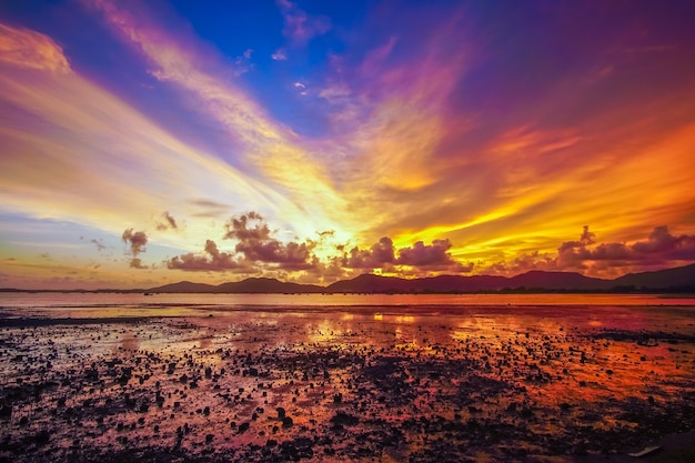 Sunset in the sea, red sky and cloud