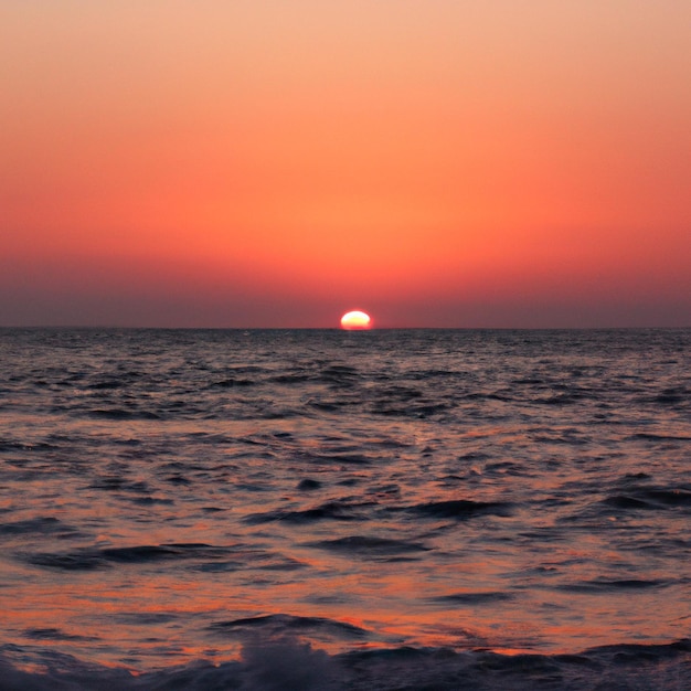 sunset on the sea, the sun above the horizon.