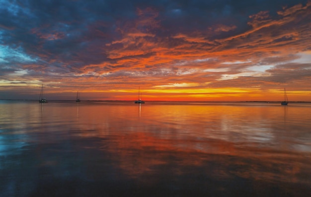 Sunset in the sea with beautiful clouds Sunrise ocean seascape