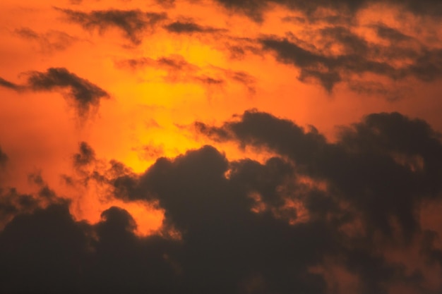 Sunset at sea with dramatic clouds.