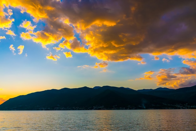 Sunset in the sky of Montenegro over the high mountains