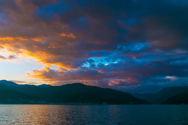 Sunset in the sky of Montenegro over the high mountains.