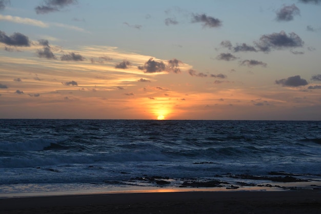 sunset sunset on the sea with orange and pink sky