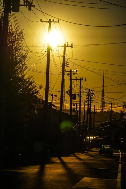 Photo sunset and telephone pole