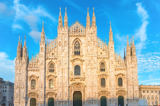 Sunset view of famous Milan Cathedral Duomo di Milano on piazza in Milan, Italy