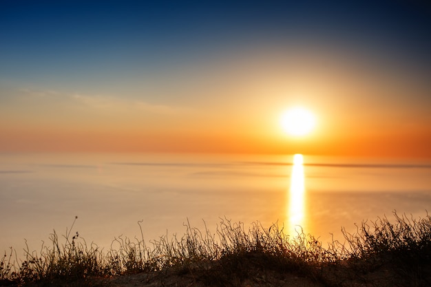 Sunset view from mountaintop. Tourism, travel, sea background.