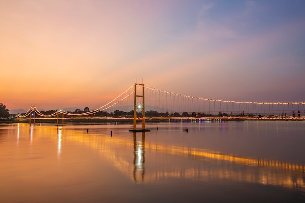 Sunset view of the Golden Gate Bridge or 200 year Rattanakosin Sompoch bridge from Tak, Thailand.