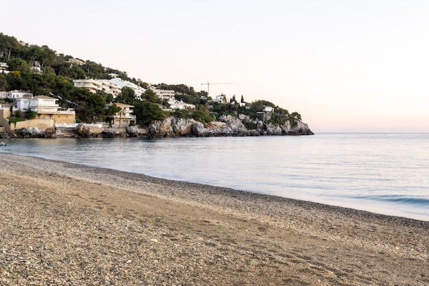 Sunset view of La Herradura Beach, AlmuÃ±ecar, Granada, Andalucia, Spain