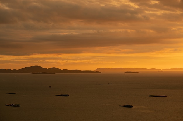 sunset with boat, nice sea, holiday and vacation