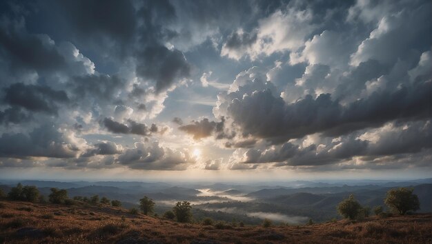 Photo a sunset with clouds and mountains in the background