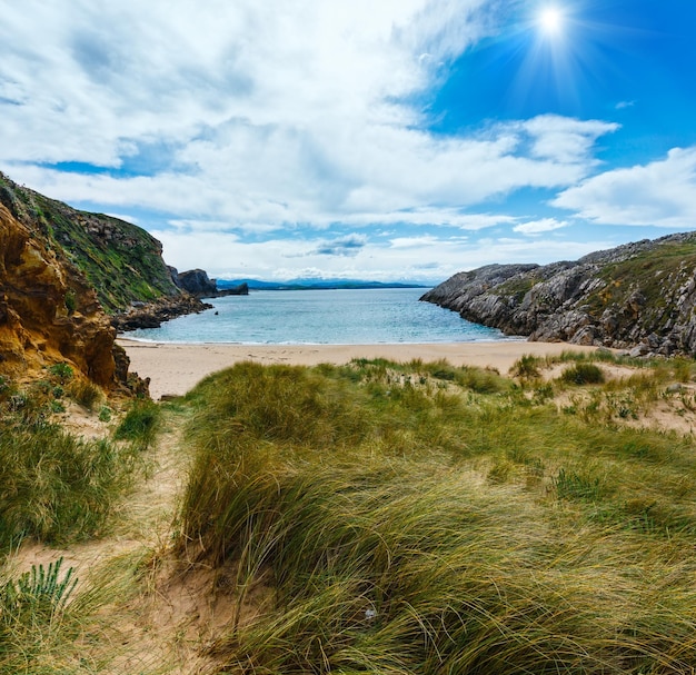 Sunshiny sandy beach Spain Atlantic Ocean coastline landscape