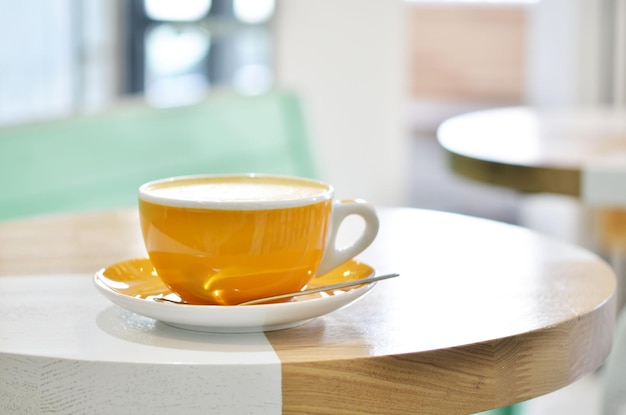 Sup of coffee on table in coffee shop cafe