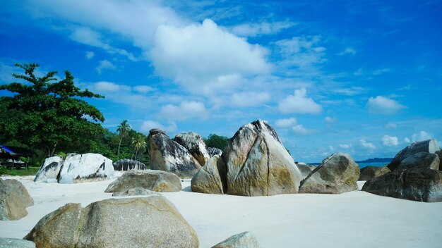 Super beautiful beach with big rocks and tropical forest on the island of bangka belitung indonesia