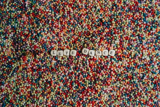 Super colorful mock up signal with happy and fun concept, colorful balls with lets dance written in dices, background, stunning, wonderful