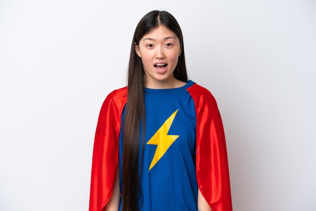 Super Hero Chinese woman isolated on white background with surprise facial expression