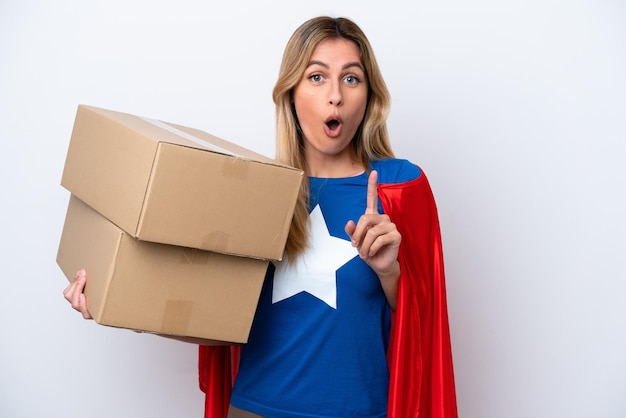 Super Hero delivery woman isolated on white background intending to realizes the solution while lifting a finger up