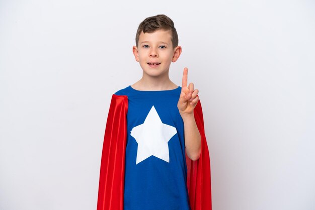 Super Hero little boy isolated on white background pointing up a great idea