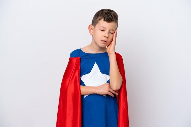 Super Hero little boy isolated on white background with headache