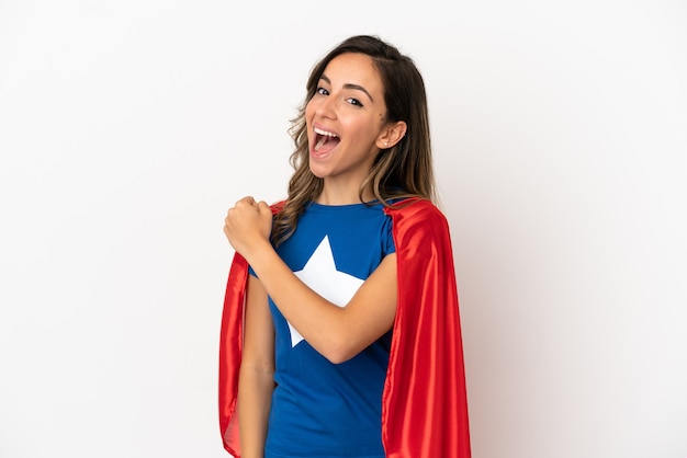 Super Hero woman over isolated white background celebrating a victory