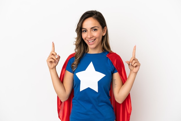 Super Hero woman over isolated white background pointing up a great idea