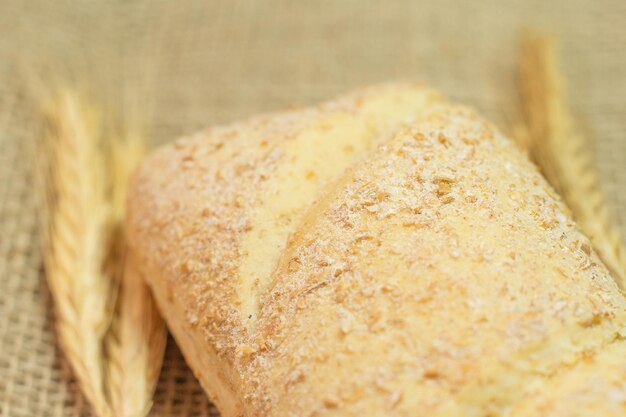 Superclose of bread on a straw table