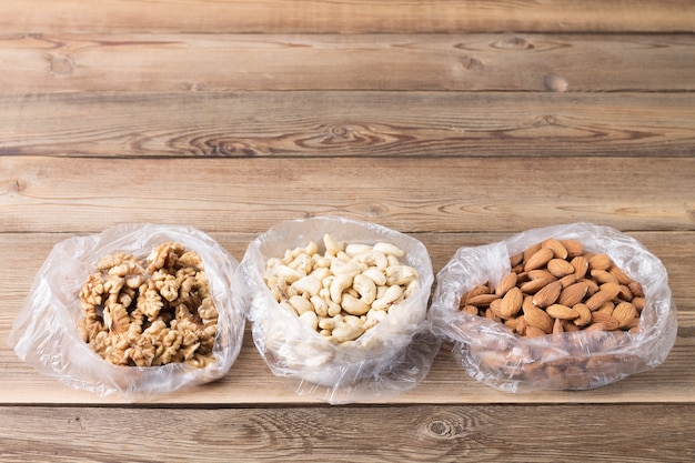 Photo superfoods walnut, almond, cashew in plastic bag