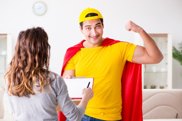 Superhero delivery guy with box