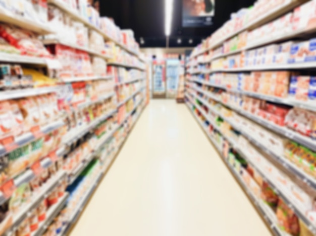 Supermarket aisle interior blurred