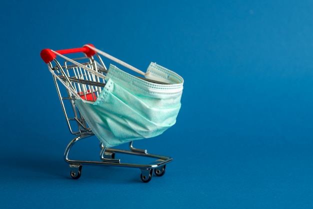 Supermarket cart for shopping with mask