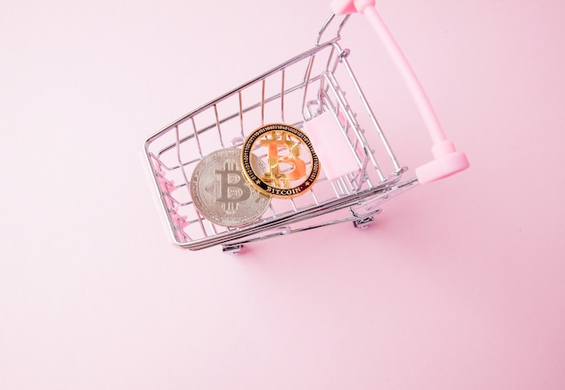 Supermarket cart with bitcoins inside