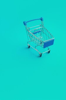 Carrello del supermercato su sfondo blu