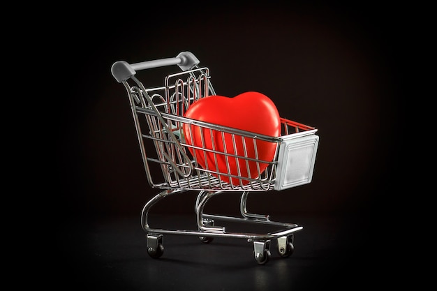 Supermarket trolley with red heart